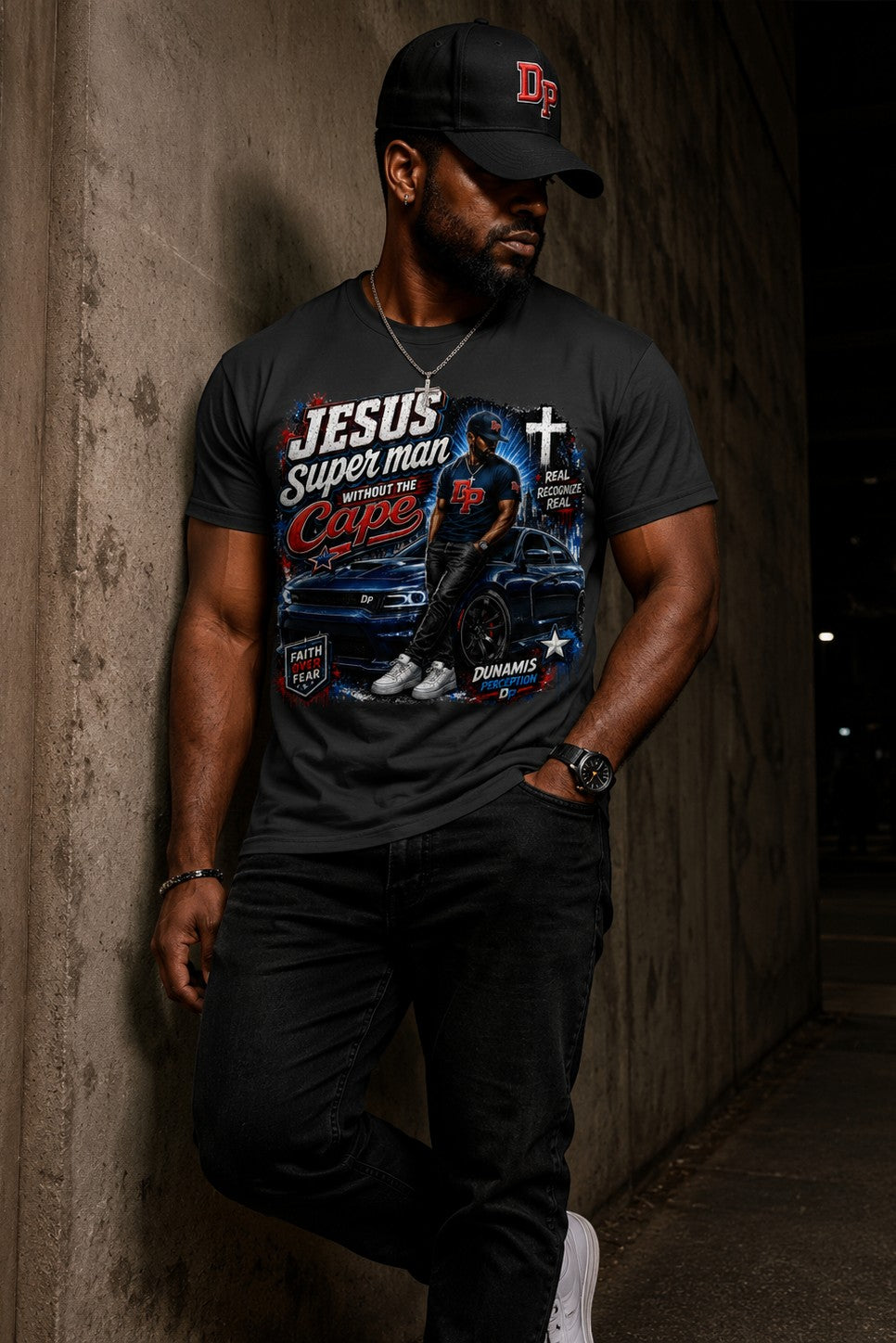 Man wearing a black Dunamis Perception Jesus..Without the Cape graphic cotton t-shirt with a car and faith design.